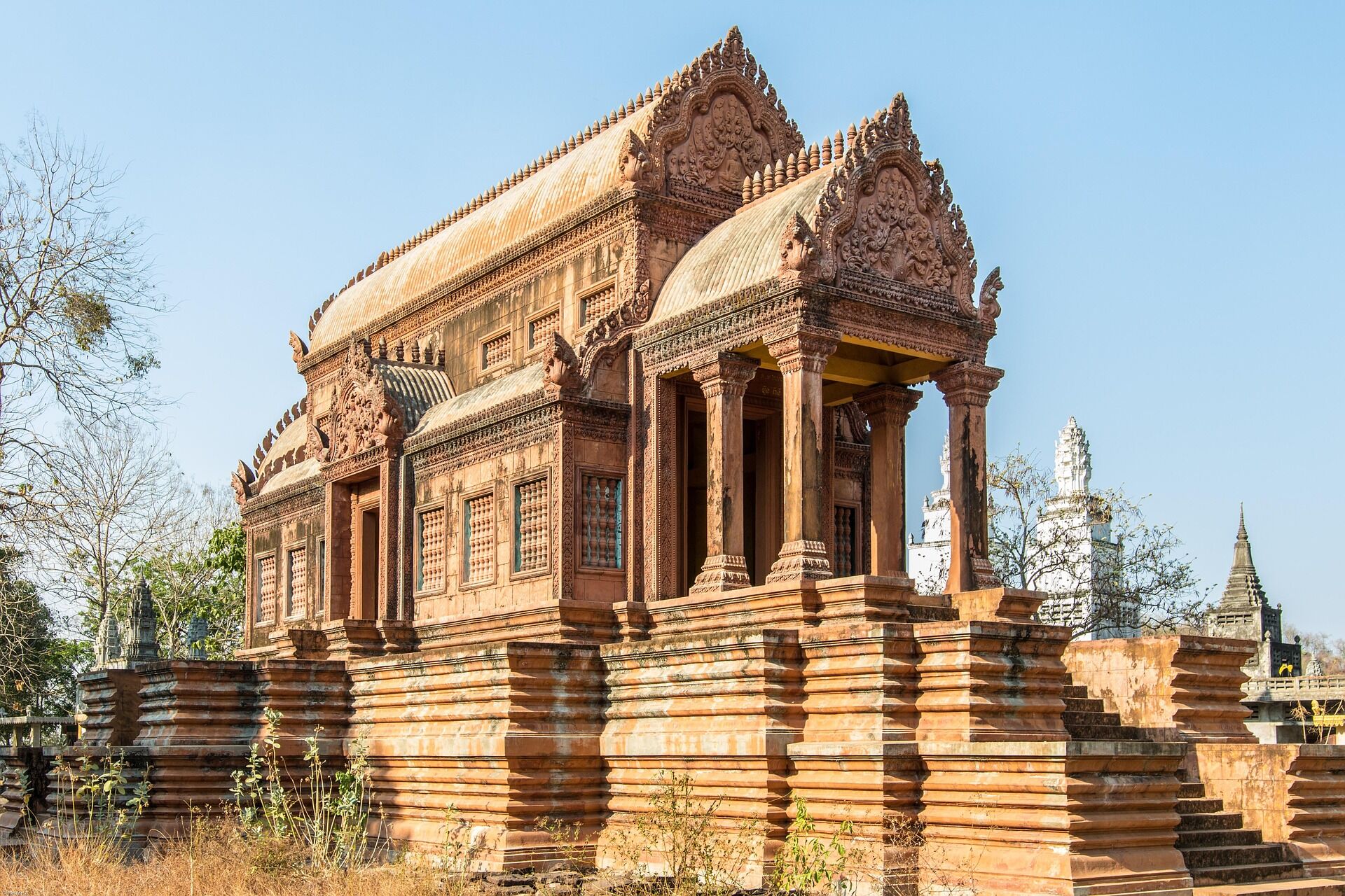 Panoramic view of Kampong Cham’s Mekong landscape for a scenic Kampong Cham Travel banner by Legend Travel Group.